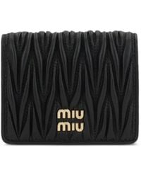 Miu Miu - Petit Portefeuille Noir En Cuir Nappa Matelassé - Lyst