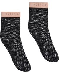 Gucci Netzstrümpfe mit Logo - Schwarz