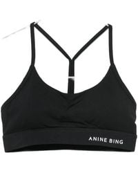 Anine Bing - Eve Logo-Print Racerback Sports Bra - Lyst