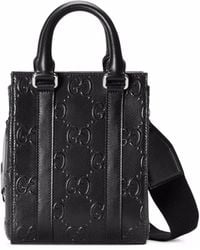 Gucci - Petit sac cabas en cuir à logo GG embossé - Lyst