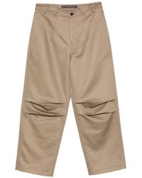 ANDERSSON BELL - Logo-Patch Panelled Trousers - Lyst
