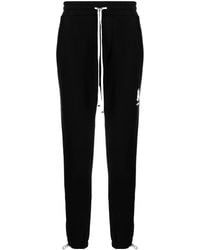 Amiri - Logo-Print Cotton Track Pants - Lyst
