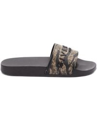 Givenchy - Logo-Embossed Slides - Lyst