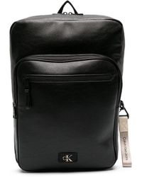 Calvin Klein - Rucksack aus Leder mit Logo-Schild - Lyst