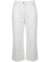 Valentino Garavani - Floral-Applique Cropped Jeans - Lyst