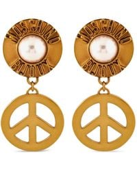 Moschino - Ohrclips Mit Friedenszeichen - Lyst