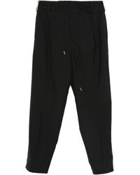 Sacai - Pantalones plisados con cordones - Lyst