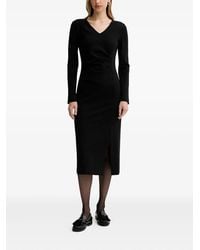 Liviana Conti - Vestido midi Filippa con cuello en V - Lyst