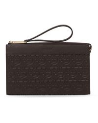 Ferragamo - Gancini Embossed Leather Clutch Bag - Lyst