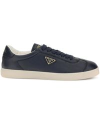 Prada - Triangle-Logo Leather Lace-Up Sneakers - Lyst
