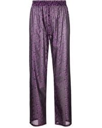 Versace - Logo-Print Semi-Sheer Pants - Lyst