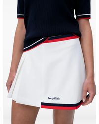 Sporty & Rich - Mila Pleated Mini Skirt - Lyst