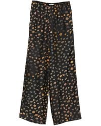 Nanushka - Elasticated Waist Dotted Trousers - Lyst