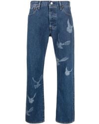 Levi's - Logo-patch straight-leg jeans - Lyst