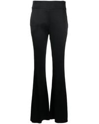 Genny - High-Waisted Flared Trousers - Lyst