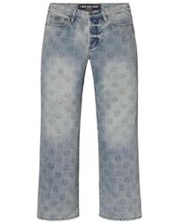 LOSTSHDWS - Embossed-Logo Jeans - Lyst