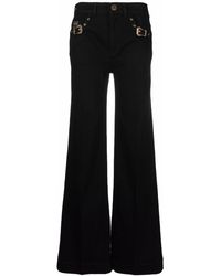 Versace - Buckle-detail Flared Trousers - Lyst
