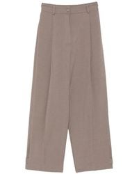 SOLOTRE - Pleated Button-Cuff Trousers - Lyst