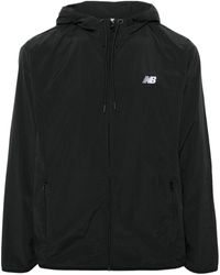 New Balance - Athletics Woven Hooded Jacket - Lyst