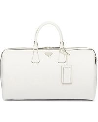 Prada - Triangle-Logo Leather Duffle Bag - Lyst