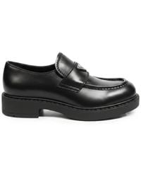 Prada - Logo-Plaque Leather Loafers - Lyst