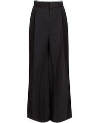 Maison Margiela - Four-Stitch Logo Palazzo Trousers - Lyst