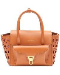 Coccinelle - Sac Cabas En Cuir À Découpes - Lyst