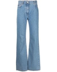 Moschino - Raw-Cut Mid-Rise Flared Jeans - Lyst