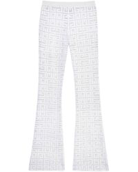 Givenchy - 4g-jacquard Flared Trousers - Lyst
