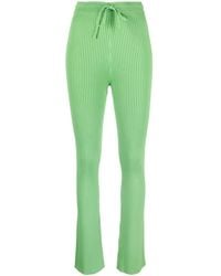 Nanushka - Cornelie Ribbed-Knit Flared Trousers - Lyst