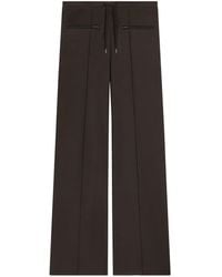 Courreges - Baggy-Hose mit tiefem Bund - Lyst