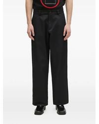 Champion - Hose mit Logo-Patch - Lyst