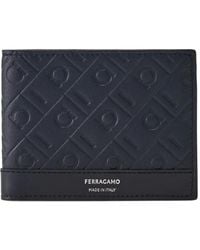 Ferragamo - Gancini-Embossed Bi-Fold Wallet - Lyst