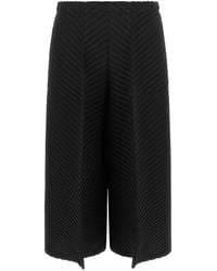 Issey Miyake - Tubular Pleats Herringbone-Pattern Trousers - Lyst
