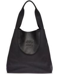 Miu Miu - Logo-embossed Leather Tote Bag - Lyst