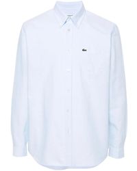 Lacoste - Camisa con parche del logo - Lyst