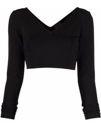 Givenchy - Top de manga larga con cuello en V - Lyst