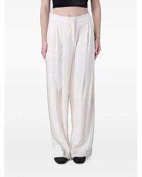 ARMANI EXCHANGE - Buttoned Pleated Trousers - Lyst
