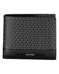 Calvin Klein - Monogram-Embossed Leather Wallet - Lyst