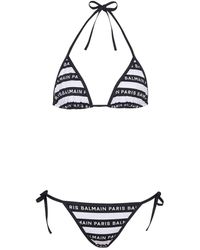 Balmain - Bikini triangular con logo estampado - Lyst