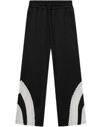ROUGH - Pantalones de chándal con bolsillos laterales - Lyst