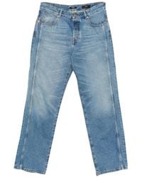 Balmain - Logo-Embroidered Wide-Leg Jeans - Lyst