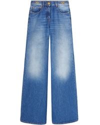 Versace - Jean en coton bleu - Lyst