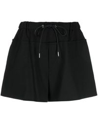 Sacai - Panelled Flared Shorts - Lyst