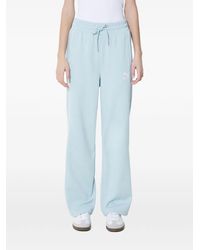 PUMA - Logo-Embroidered Side-Stripe Track Pants - Lyst