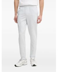 Under Armour - Ua Unstoppable Logo-Patch Elasticated-Waistband Trousers - Lyst