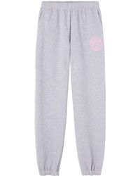 Versace - Pantalon de jogging en coton à logo imprimé - Lyst