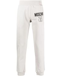 Moschino - Smiley-Print Logo Track Trousers - Lyst