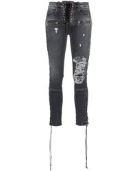 Unravel Project Vaqueros pitillo rasgados con efecto lavado - Gris