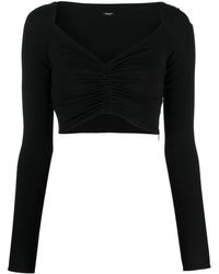 Versace - Blusa corta con cuello en V - Lyst